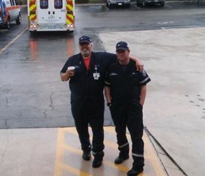 Paul Besaw and Lahiri Garcia were killed when the ambulance they were in flipped onto its side in a vehicle crash. (Photo/AMR)