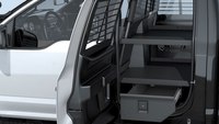 Vehicle storage and prisoner transport built for pickup-driving cops