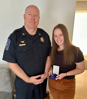 Sheriff Hall awarded CO Hanna Suite the Sheriff’s Office Purple Heart Medal for standing her ground and refusing to give up.