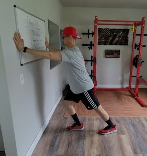The heel and calf stretch targets the muscles in your lower leg, specifically your calf muscles.