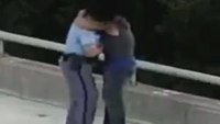 Video: NC officer hugs suicidal man after talking him off bridge ledge