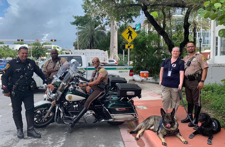 K-9s Tarik and Exon with police after the Champlain Tower Collapse in Surfside, Florida, June 2021.