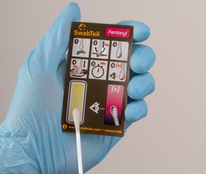 SwabTek dry test kits feature reagent embedded in a card that includes easy-to-follow directions and the range of colors that indicate a positive result.