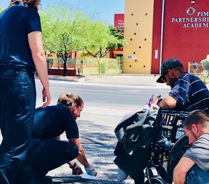 TC-3 Navigators Jenny La Coss and Natalie Becker assist a client with basic needs. One of the first thing a TC-3 navigator ensures is that the client's basic needs are met. This includes food, water, shelter and warmth.