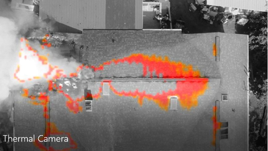 A drone uses a thermal imager at a house fire.