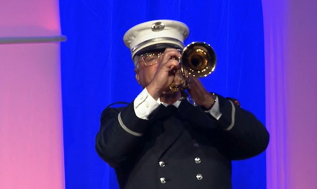 Minogue played “Taps” to conclude the ceremony.