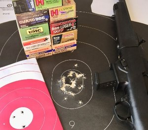The Ruger never jammed or misfired with numerous types of ammunition. Pink target shows three rounds at 50 yards from a rest. Silhouette target shows 30 rounds standing offhand at 25 yards with iron sights, outstanding reliability and accuracy from Ruger. (Photo/Steve Tracy)