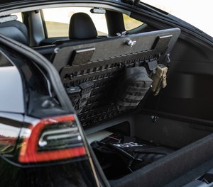 Customized storage from TruckVault in the vehicle’s hatchback secures weapons and essential gear.