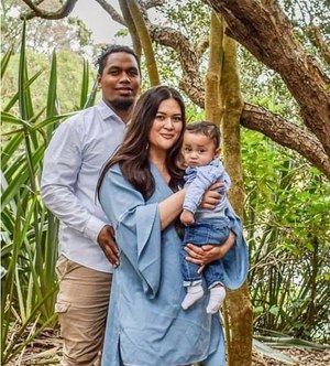 Tevita Bryce with his family. Bryce is alive today thanks to the quick thinking of six people on the sidelines, who used their emergency medical training when he collapsed on the field.