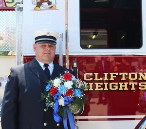 Firefighter Thomas Royds, 49, was killed, and two other firefighters and a state trooper were injured when struck while responding to a vehicle crash.