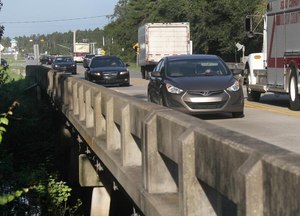 Traffic rolls across the Tomoka River Bridge in Daytona Beach, Florida, during a morning rush hour in 2018. Image: News-Journal/David Tucker via TNS