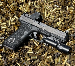 The Trijicon RMR HD is an innovative open emitter pistol-mounted red dot optic specifically designed to meet the needs of both law enforcement and the military.