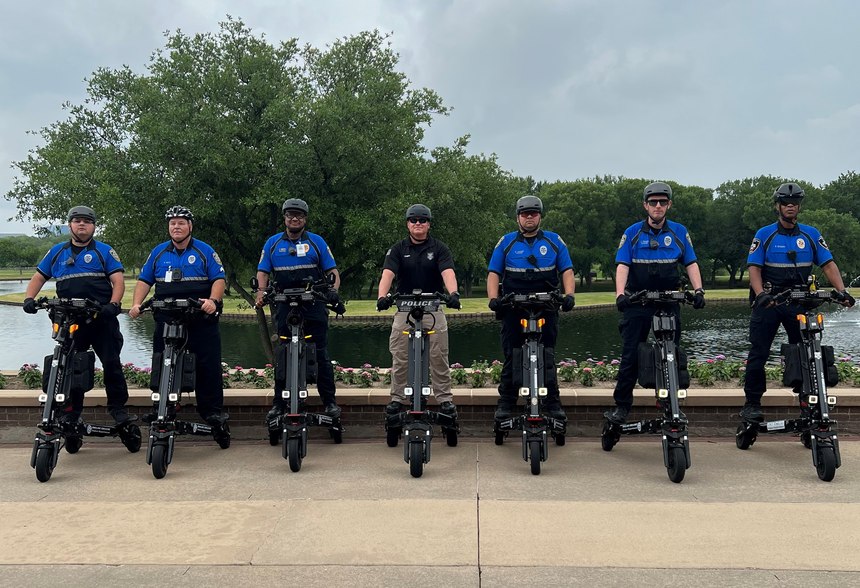 Dallas College Police Department Trikke Master Instructors (l-r: Officer Andres Guadiana, Corporal Robert Boyd, Captain James Smith, Jr., Scott Campf, Officer Raul Valdez, Officer Collin Fisher, Officer Frederick Every)