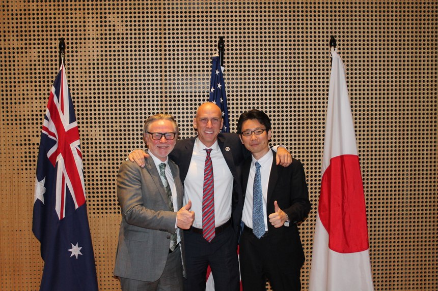 The author (pictured in the center) worked on the Trilateral Infrastructure partnership with Japan, Australia and the US. 