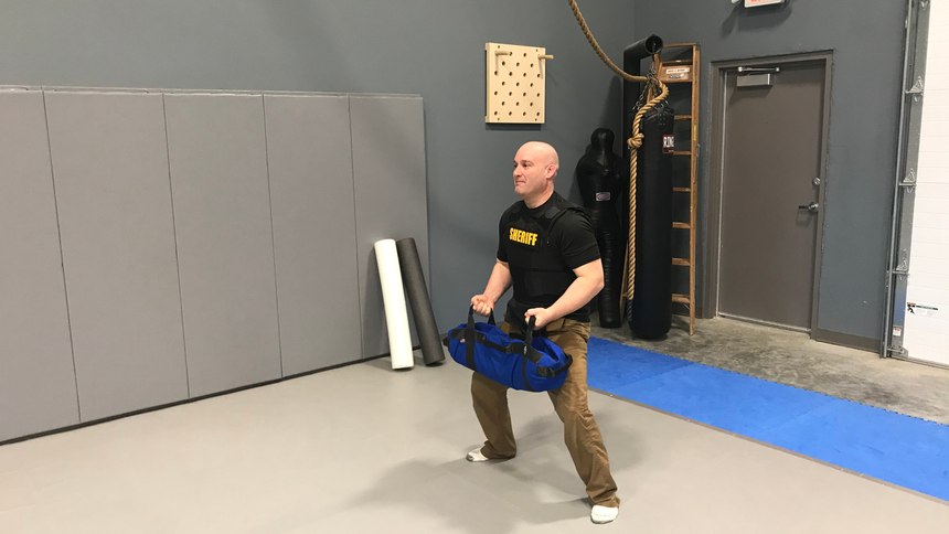 Because a sandbag’s weight shifts inside the bag itself, you are forced to adjust and use stabilization muscles that you would not normally engage with free weights.