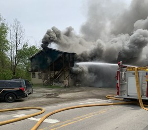 A man allegedly bit a firefighter at the scene of an apartment complex fire in Adrian, W.Va., last week.