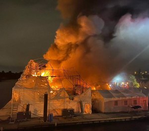 Broward County firefighters spent about four hours early on Saturday battling fires aboard two luxury yachts that caused nearly $20 million in damage. (Photo/Handout, TNS)