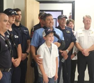 First responders gave Brody a tour of the inside of a training apparatus used at Grayson College to prepare EMTs for the types of trauma situations they may experience in the field.