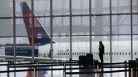 Passenger flees Atlanta airport after gun discharges, causing panic; 3 hurt