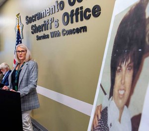 Retired Detective Micky Links speaks during a press conference at the Sacramento County Sheriff's Office to announce the solving of the 1970 cold case murder of Nancy Bennallack, pictured at right.