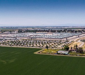 The California Health Care Facility, a prison hospital in south Stockton, houses about 2,600 inmates. Aerial photograph by drone on May 2, 2019. A patient at the prison died from Legionnaires' disease in 2018, and the inmates at the facility and two nearby youth correctional centers remain on bottled water while the water system is treated. (Hector Amezcua/Sacramento Bee/TNS)