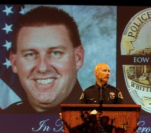 Whittier police chief Jeff Piper speaks at the funeral service of slain Whittier police officer Keith Boyer at Calvary Chapel on March 3, 2017 in Downey, Calif.