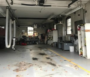 This bay at Station 7 on Spooner Street was empty Thursday after the pump truck had to be evacuated to prevent the floor from collapsing. (Wicked Local Photo via Tribune News Service/Emily Clark)