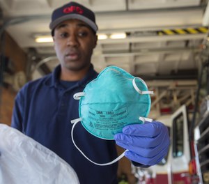 Quincy's firefighters carry medical masks to try and prevent the spread of COVID-19. The masks are even mor valuable amid a nationwide shortage.