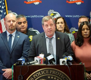 Craig Lally, center, president of the Los Angeles Police Protective League, speaks during a press conference at the Los Angeles Police Protective League in downtown Los Angleles on Wednesday, Dec. 4, 2019.