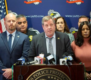 Craig Lally, center, president of the Los Angeles Police Protective League, speaks during a press conference at the Los Angeles Police Protective League in downtown Los Angleles on Wednesday, Dec. 4, 2019.