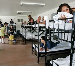 Marysol Chacon (top right) and other inmates must deal with crowding at the Las Colinas jail. (Photo/Laura Embry of the Union-Tribune via TNS)