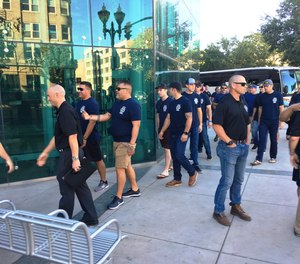 Firefighters from Stockton and throughout San Joaquin County arrive at the County Administration Building after marching together in solidarity from Station 2.