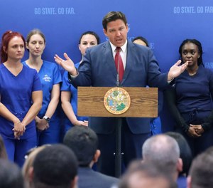 Florida Gov. Ron DeSantis answers questions during a press conference at Seminole State College in Sanford, Florida, Monday, May 16, 2022. DeSantis, at the school to announce $125 million in funding for nursing education, said the state will likely take over Disney World's Reedy Creek Improvement District, rather than local governments absorbing it.