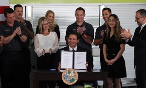 Gov. Ron DeSantis signs a law on Monday that gives the state control of Disney World’s Reedy Creek Improvement District, stripping the resort of its self-governing powers. The signing took place at Reedy Creek Fire Station No. 4.