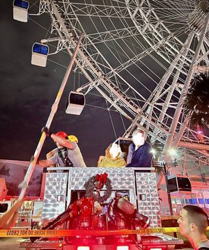 Dozens of riders had to be rescued from The Wheel at ICON Park on Saturday, but no one sustained injuries.