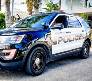 A Miami police officer's wife has died after being accidentally locked inside the backseat of an SUV like this one.