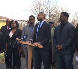Former Linden firefighters Joseph Braxton and Mark Bullock, standing on either side of Rev. Barry Wise, center, accuse their former Linden Fire Department colleagues and fire chief of racial discrimination in a lawsuit filed Nov. 19, 2019. (Photo/Jenna Wise, NJ Advance Media for NJ.com)