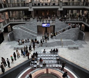 Opponents of the planned public safety training center in DeKalb County descend on Atlanta City Hall during the May 15 full council meeting to sign up for public comment.