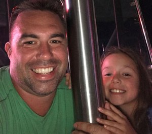 Fallen Worcester Firefighter Christopher Roy and his daughter, Ava. Momoh Kamara is charged with second-degree murder and arson in connection with the December 2018 blaze that killed Roy in the line of duty. (Photo/Contributed, masslive.com)