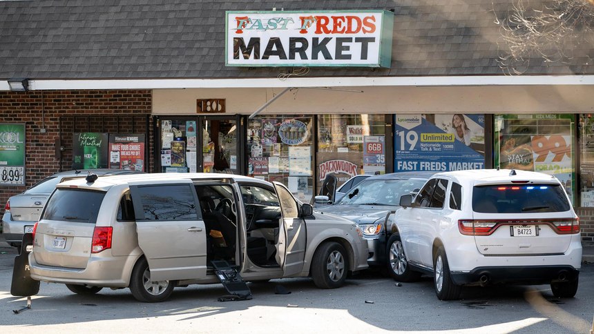 Police shields, gun magazines and shot out windshields remain in the parking lot of Fast Freds Market after police tried to arrest suspects in an undercover investigation of fentanyl dealing on Wednesday, April 5, 2023, in Kansas City, Kansas. (Nick Wagner/The Kansas City Star/TNS)