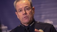 Man takes officer's gun, opens fire inside LA police station
