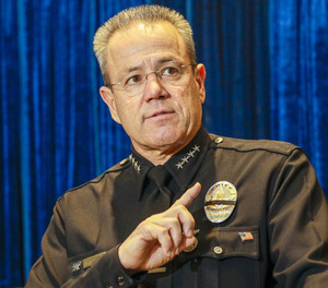 LAPD Chief Michel Moore, addresses a press conference, flanked by Anne Tremblay, left, Director of Mayor's Gang Reduction and Youth Development, Eileen M. Decker, President Los Angeles Police Commission, Mayor Eric Garcetti and City Councilwoman Monica Rodriguez to discuss 2019 crime statistics of Los Angeles on Jan. 15, 2020.