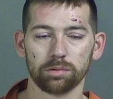 Raymond E. Kibby, 33, is accused of stealing an ambulance from outside of McLaren Flint to try and go purchase heroin on the city's south side.