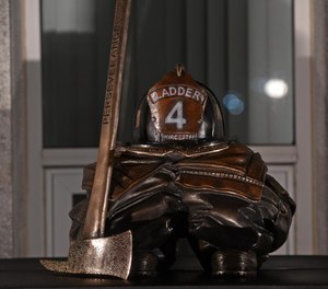 A memorial sculpture honoring fallen Worcester Firefighter Christopher Roy was unveiled on Monday at the Webster Square Fire Station in Worcester.