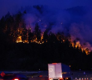 The Milepost 97 fire has grown to more than 11,000 acres. (Photo/Tribune News Service)