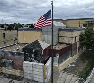 The Minneapolis 3rd Precinct, which held backup 911 equipment, was destroyed in last year's riots.