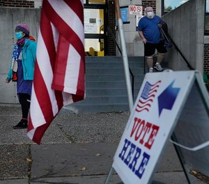 Voters exit Sabathani Community Center after casting their ballots during municipal elections Tuesday, Nov. 2, 2021, in Minneapolis.