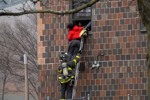 FDNY firefighters helped people get out of the apartment building.
