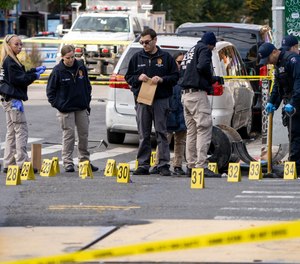 Parolee shot after brandishing a gun during confrontation in Manhattan.