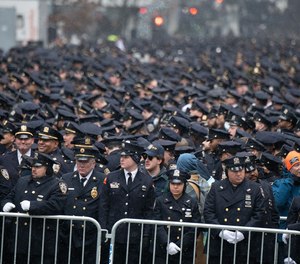 Law enforcement officers gather for the funeral of NYPD officer Jason Rivera Friday at St. Patrick's Cathedral, Jan. 28, 2022, in Manhattan, New York.
